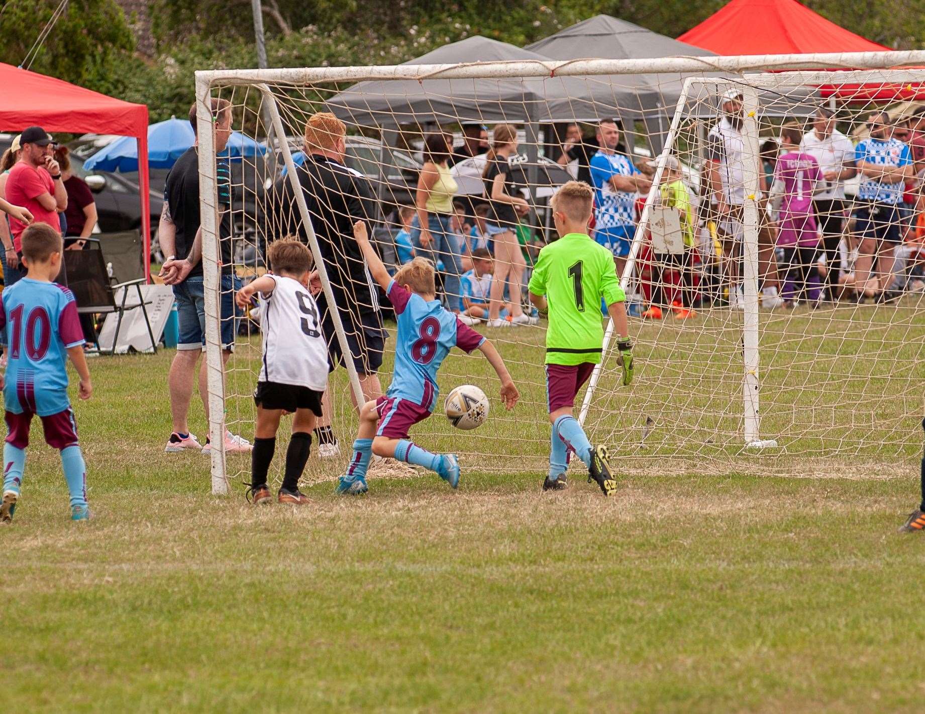 Action from the annual Wisbech St Mary football tournament.