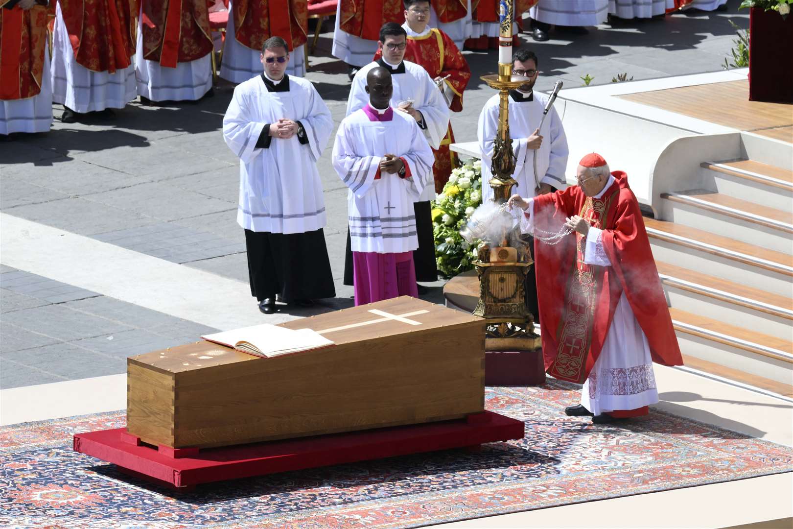 The service was led by Cardinal Dean Giovanni Battista Re (Vatican Media/AP)