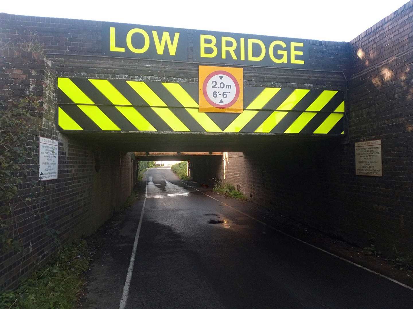 New signs have gone up on Stonea Underpass to try to avert future collisions – but there are still regular vehicle strikes. Photo: Graham Chappell.