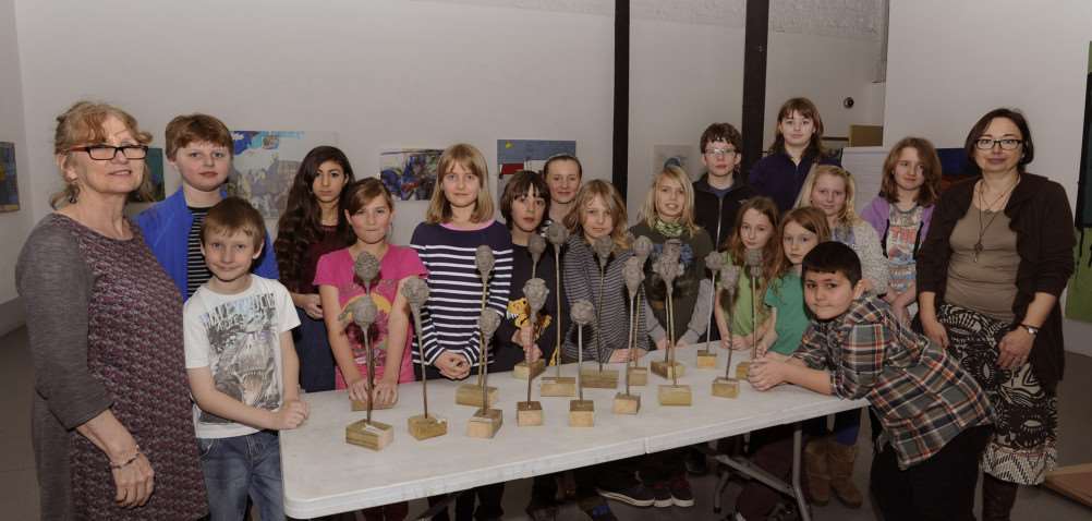 The Final Home Educators session at King's Lynn Art Centre, young students with some of the session work, also in pic Liz Falconbridge (left Chief Executive Officer) and Karin Forman (right Freelance Artist) ANL-150126-165500009