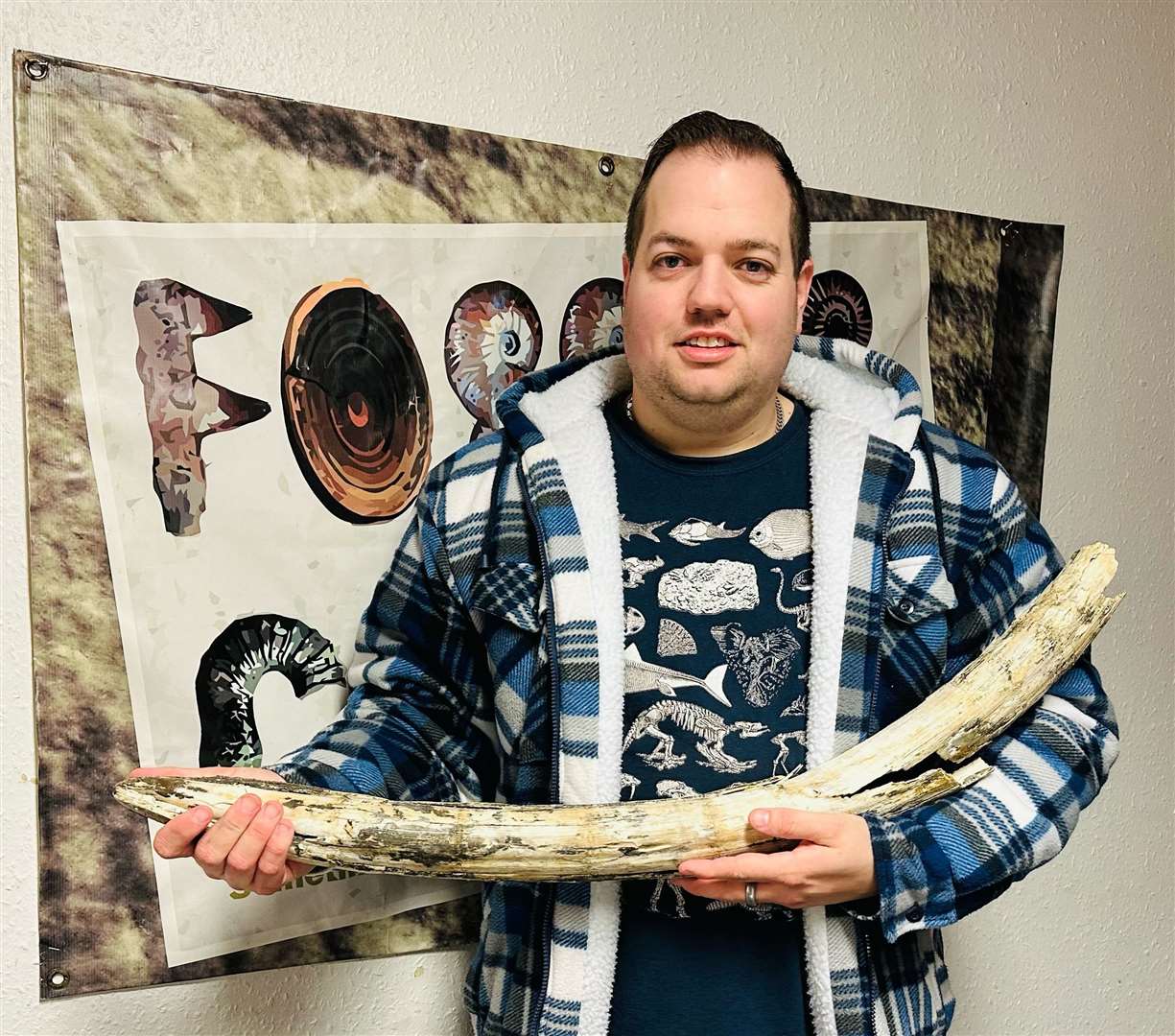 Jamie Jordan with the mammoth tusk. (62472543)