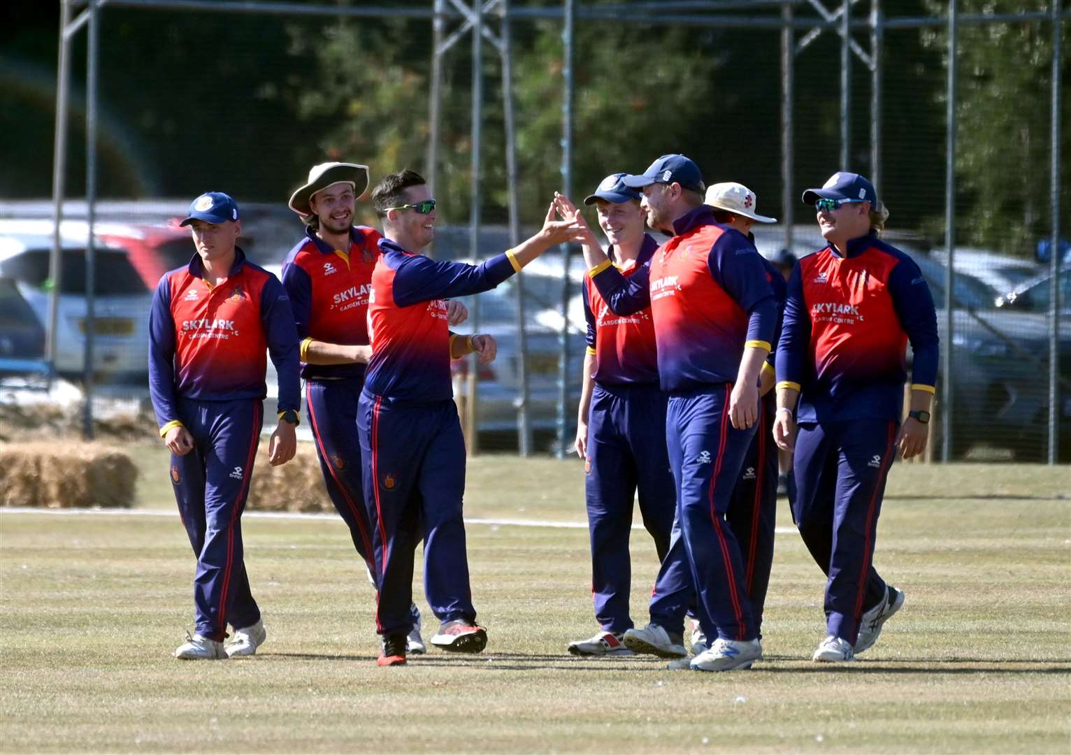 Wisbech cricket club hosting the Lashings cricket club..Wisbech celebrating the wicket of Kirk Edwards. (58619573)