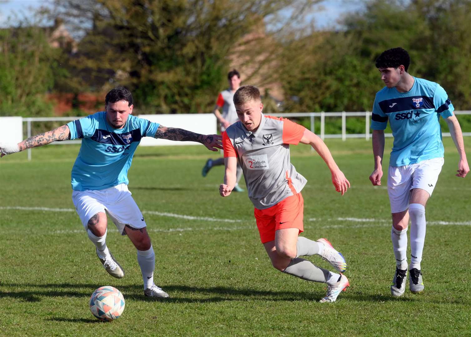 Parson Drove (grey and orange) v Holland (blue). Harrison Taylor