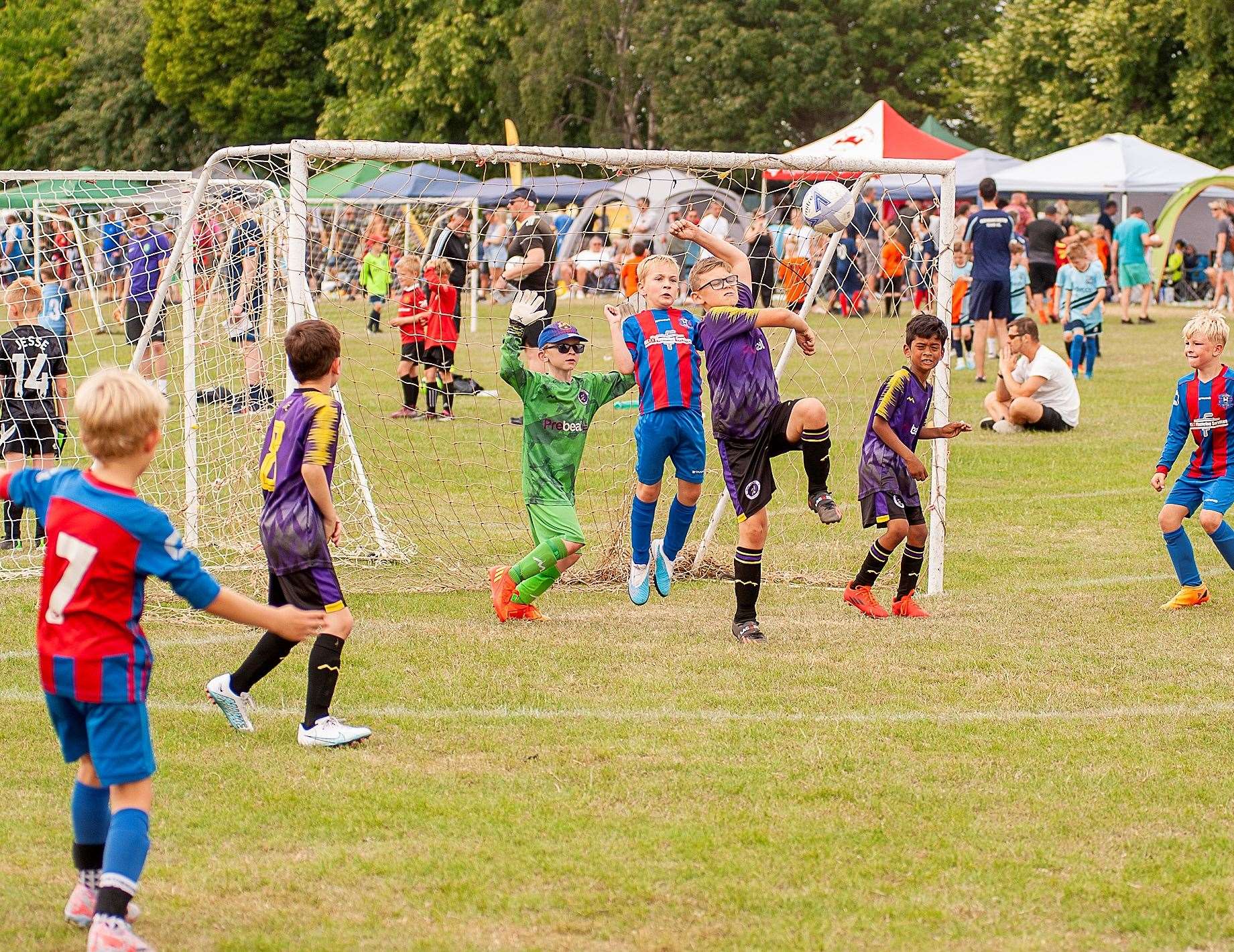 Action from the annual Wisbech St Mary football tournament.