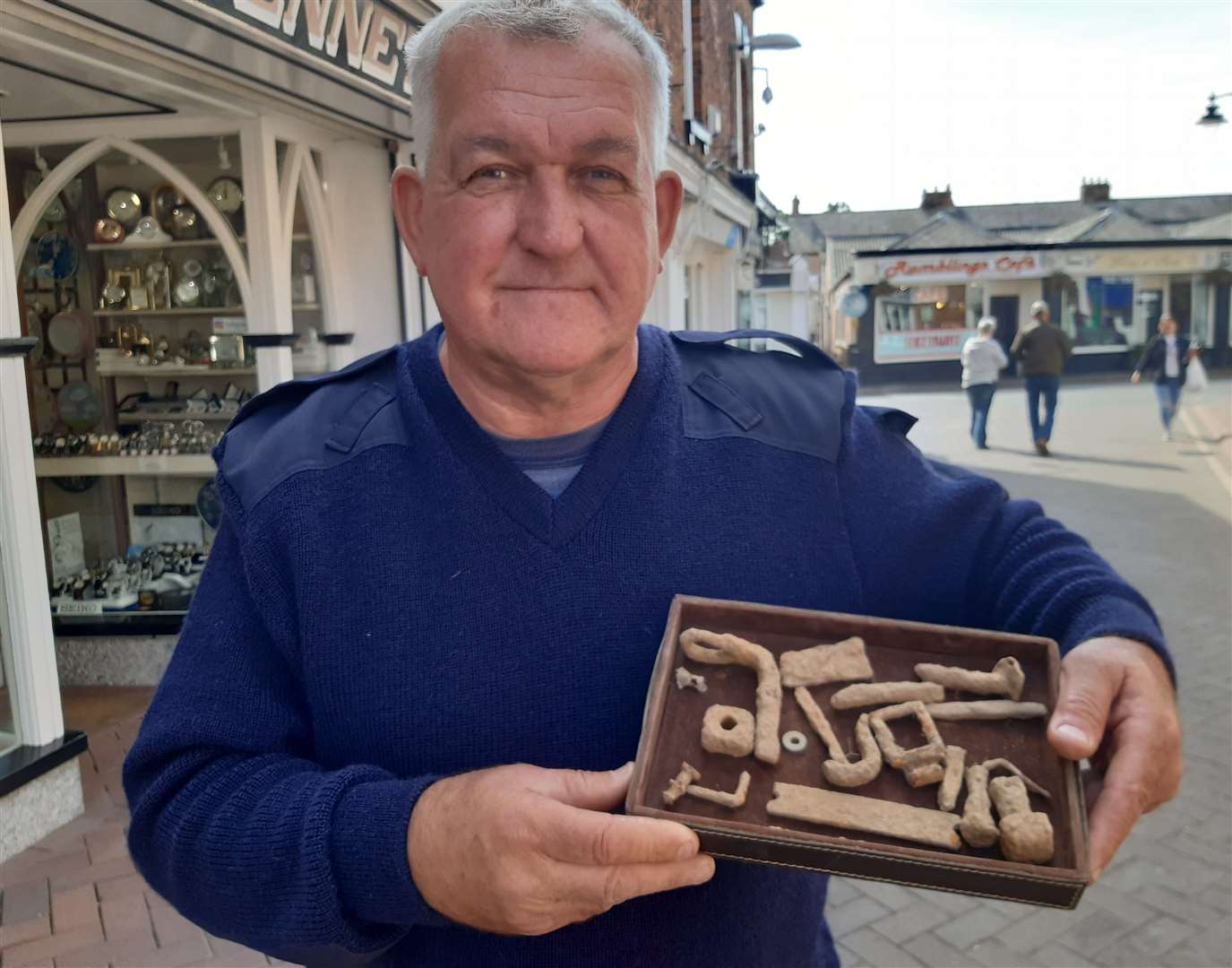 Raymond Kosschuk with some of the artefacts found in a field he believes holds King John's treasure