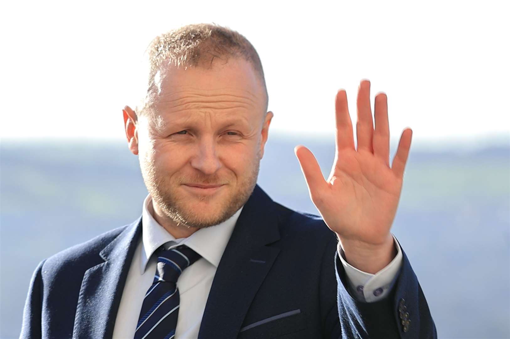 Jamie Bryson, a loyalist activist is seeking a judicial review of the minister’s decision (Liam McBurney/PA)
