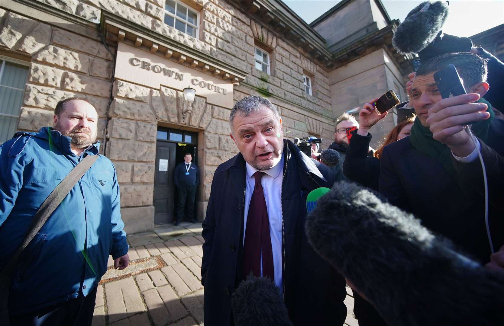 Runcorn and Helsby MP Mike Amesbury (centre) leaving Chester Crown Court after he had his 10-week prison sentence for assault suspended for two years (Peter Byrne/PA)