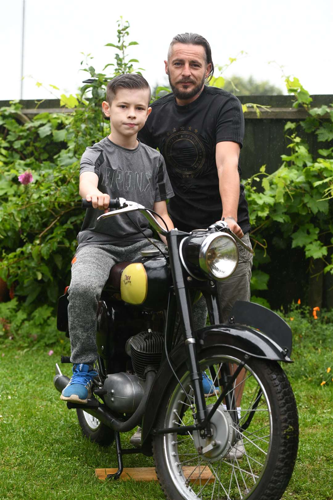 Reece and Phil Doughty who have worked together to restore a motorbike during lockdown. (36864351)