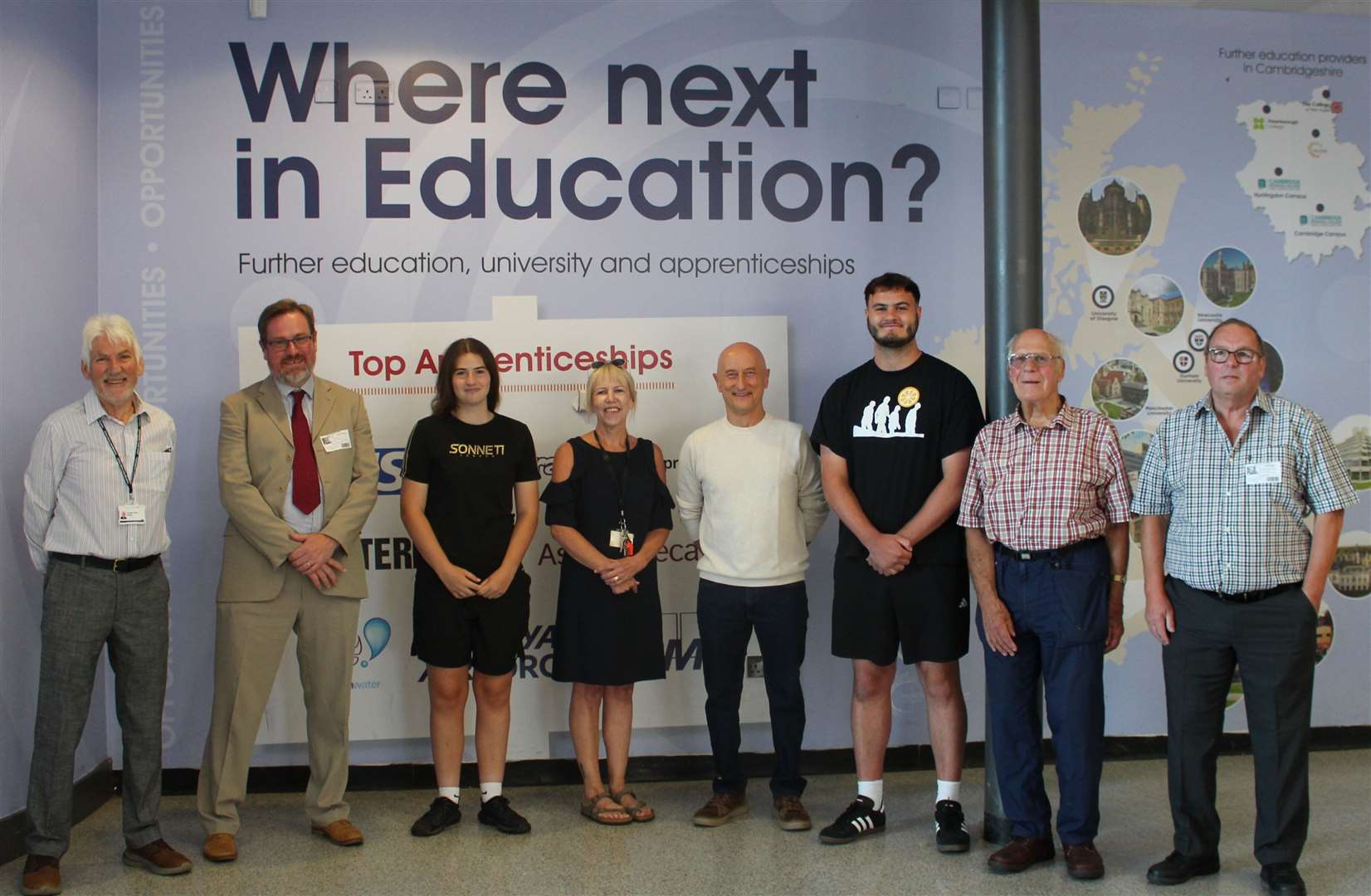 Millie Jolley, third from left, and Charlie Gatty third from right pictured with Kathryn Gribble, Neale-Wade's sixth form lead, centre, and members of the March Endowment Fund.