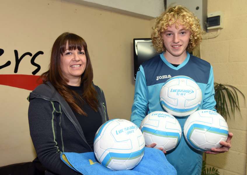 Hungate FC presentation of footballs after Lucozade promotion, the club collected more than 300 bottle tops to earn the footballs at Lakers Gym, Wisbech: 'left to right Cheryl Garner from Lakers and Alex Bishop Hungate Rovers ANL-151123-085011009