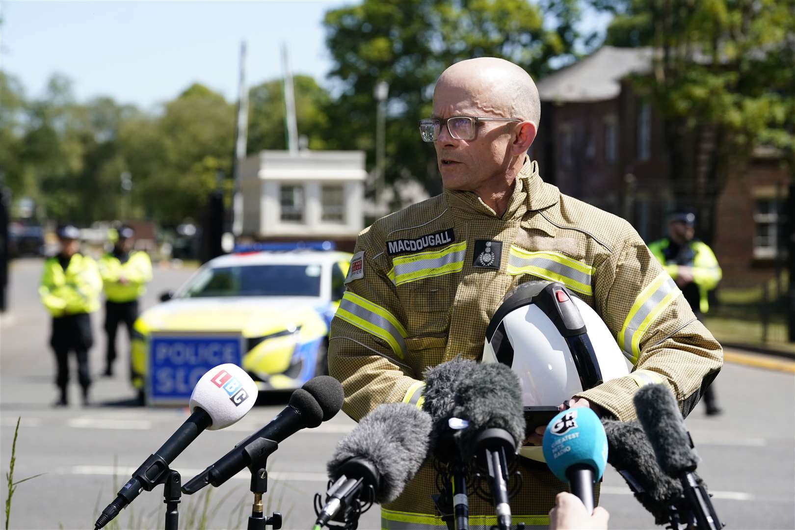 Chief fire officer Rob MacDougall gave an emotional tribute at the scene on Friday (Andrew Matthews/PA)