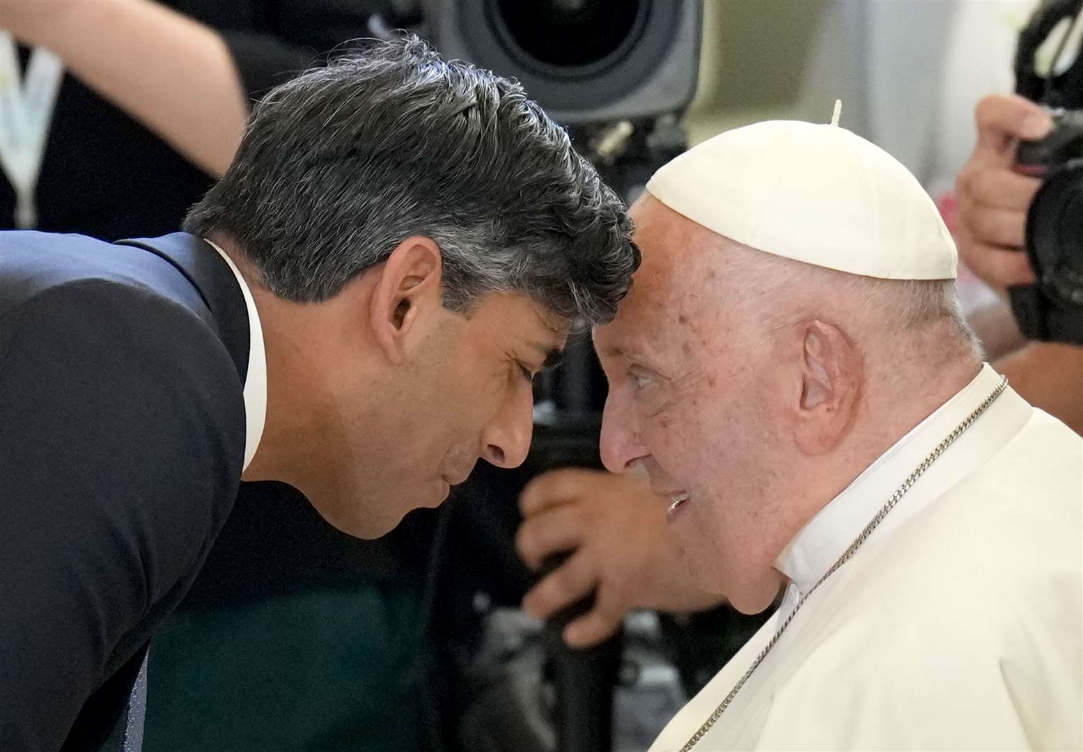 Then-prime minister Rishi Sunak welcomed the Pope ahead of a session during the G7 leaders’ summit in Puglia Italy in June last year (PA)