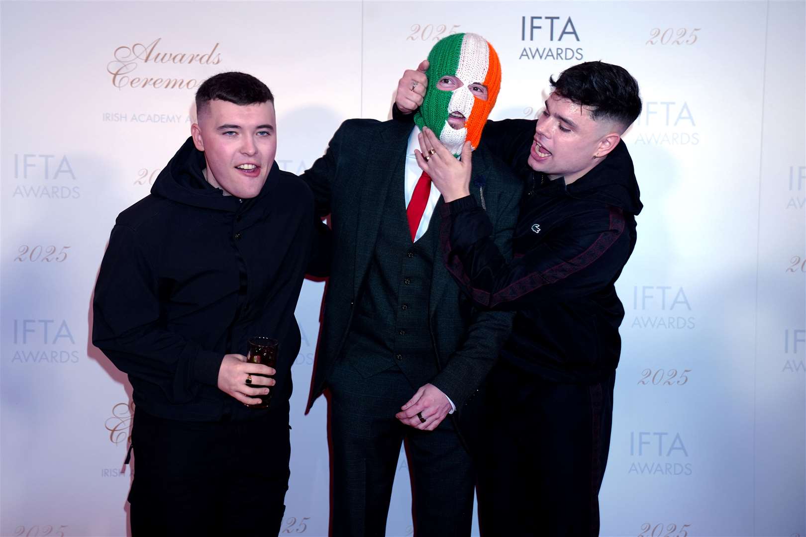 Members of Kneecap, left to right, Mo Chara, JJ O’Dochartaigh and Moglai Bap (Brian Lawless/PA)