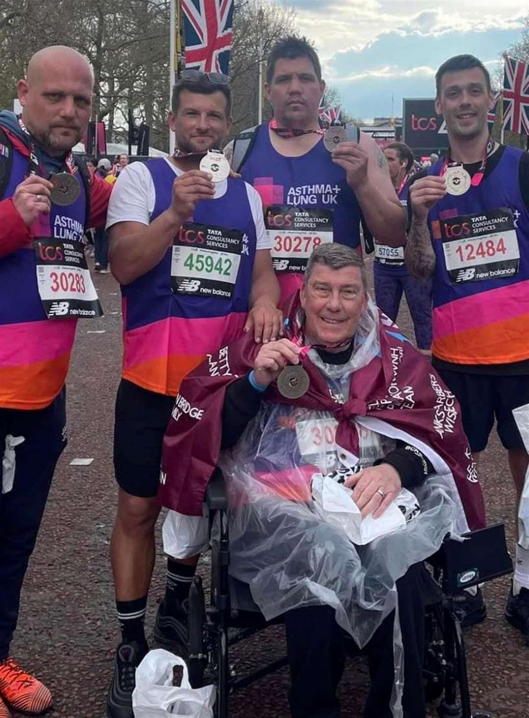 Gerry with his three sons and his good friend