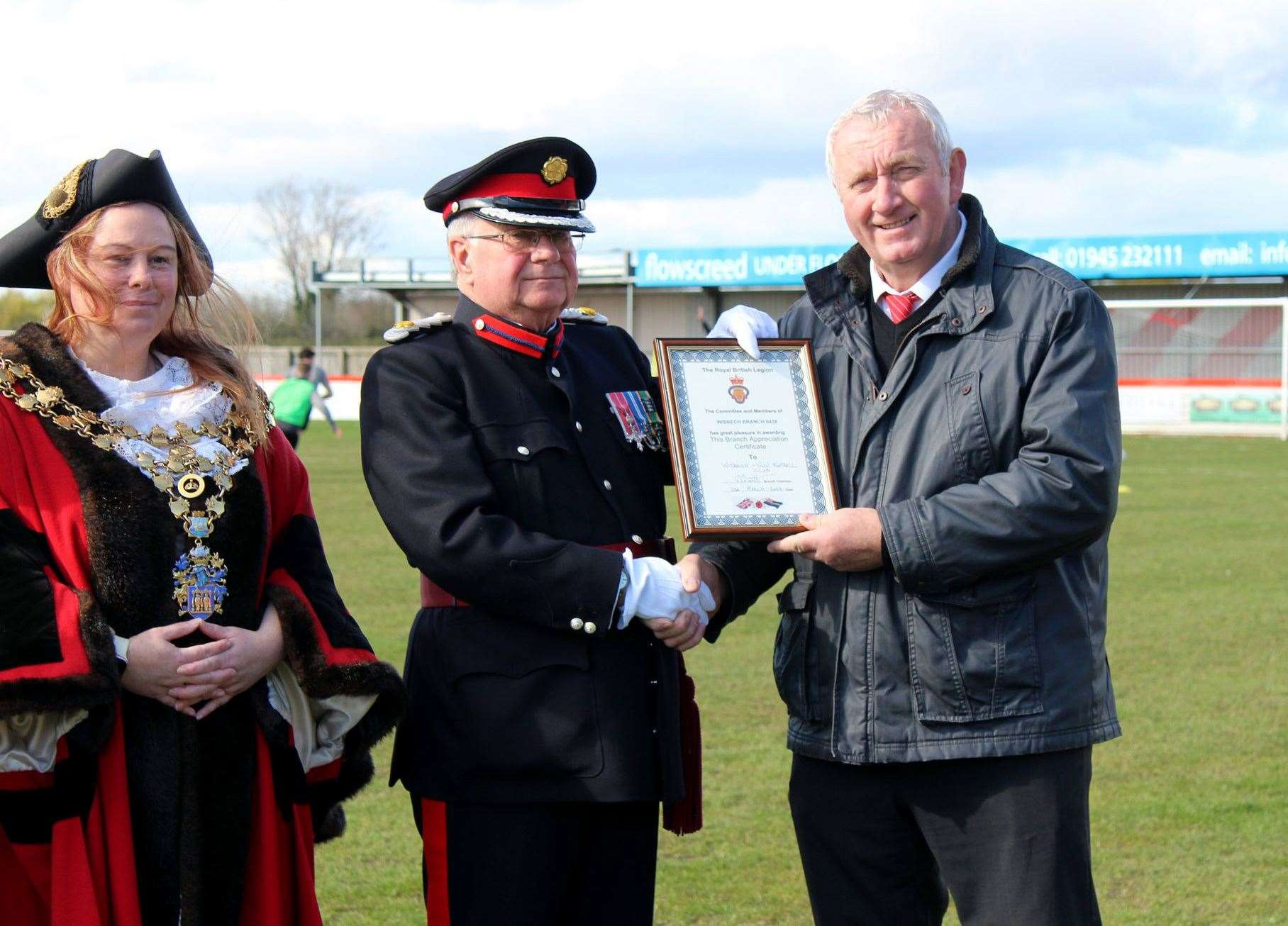 Wisbech Town Football awarded with the Armed Forces Covenant Award...Wisbech Mayor Susan Wallwork, Deputy..Lieutenant Mark Knight and Chairman of Wisbech FC Paul Brenchley. (63204069)