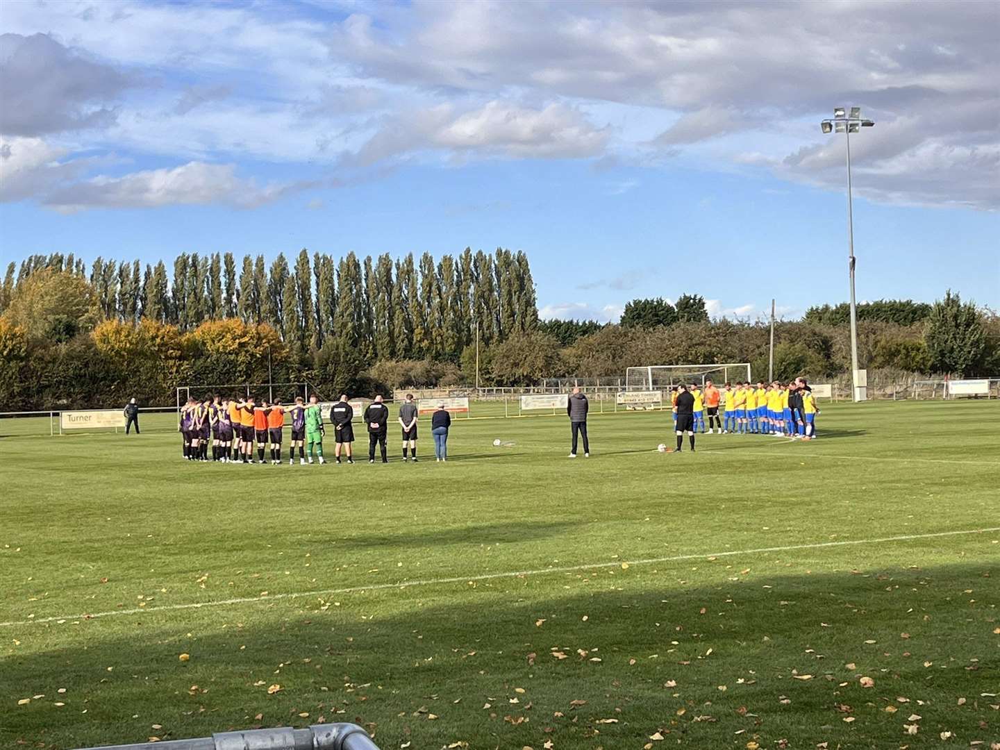 Wisbech St Mary and Cherry Hinton players pay respects (60023940)