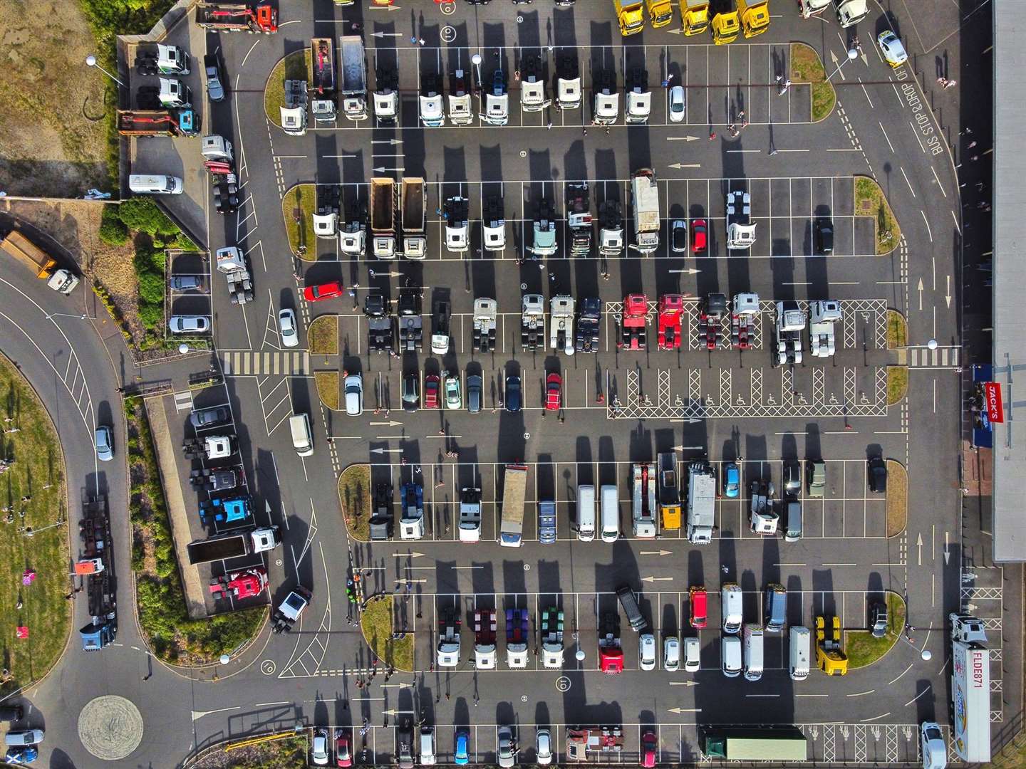 Around 70 lorries gathered at Jack's supermarket car park before heading in convoy to Peterborough City Hospital to pay tribute to the NHS. Photo: X21 Photography. (35232615)