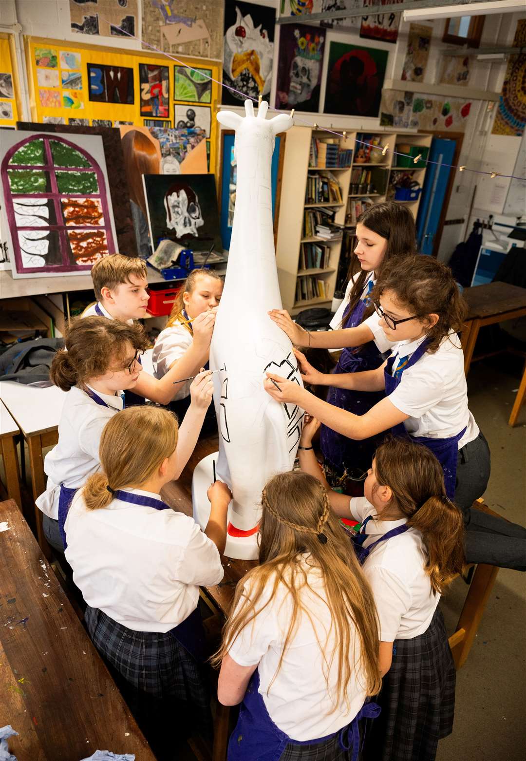 It's not every day you find a giraffe in a rural West Norfolk village, but one has made its home at Marshland High School before taking part in a city art trail next year. Photo: Barking Dog Media/Ian Burt.