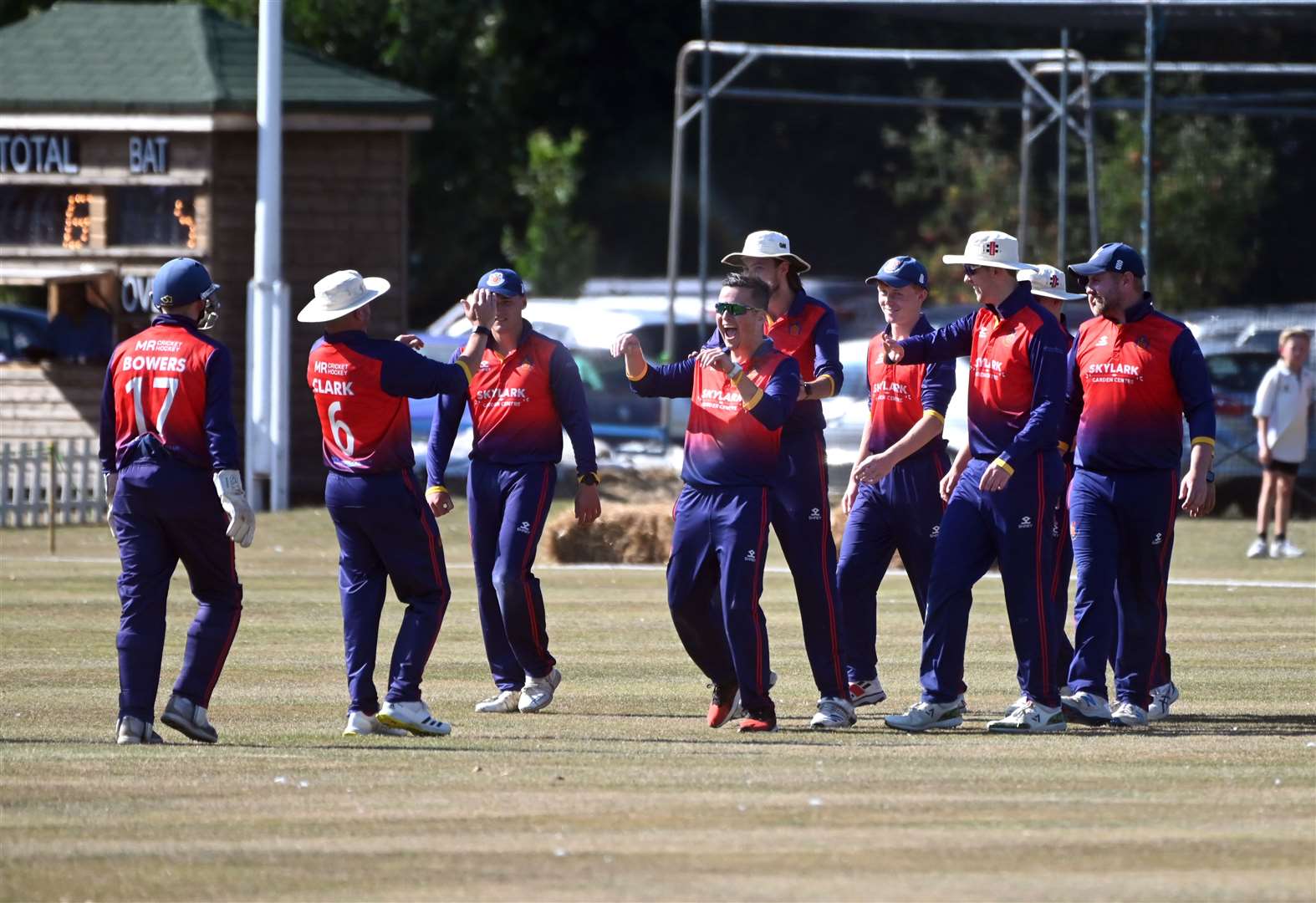 Wisbech cricket club hosting the Lashings cricket club..Wisbech celebrating the wicket of Kirk Edwards. (58619575)