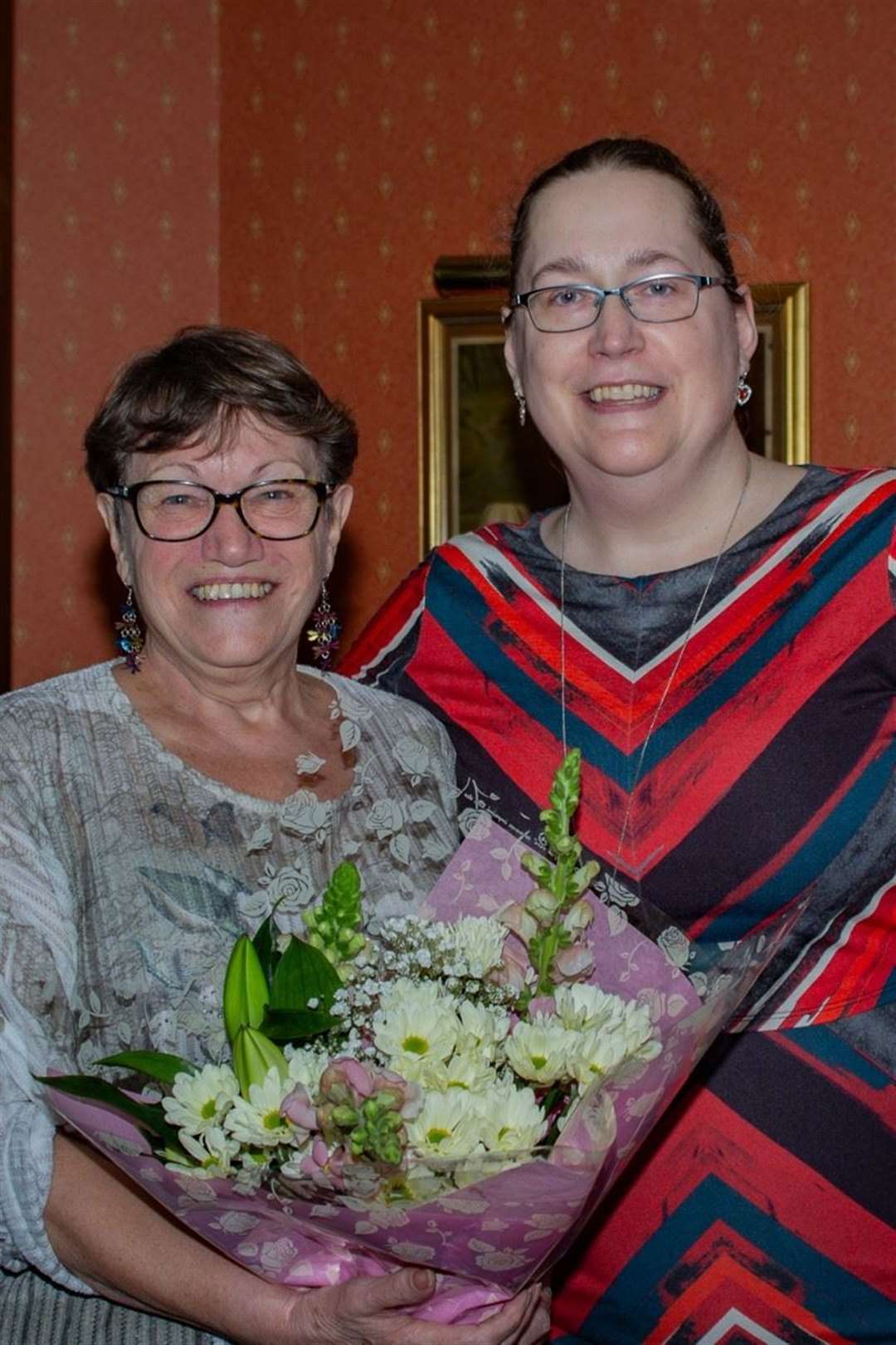 Outgoing Poppy Appeal organiser Lynda Behagg (left) with new organiser Caroline Hopper