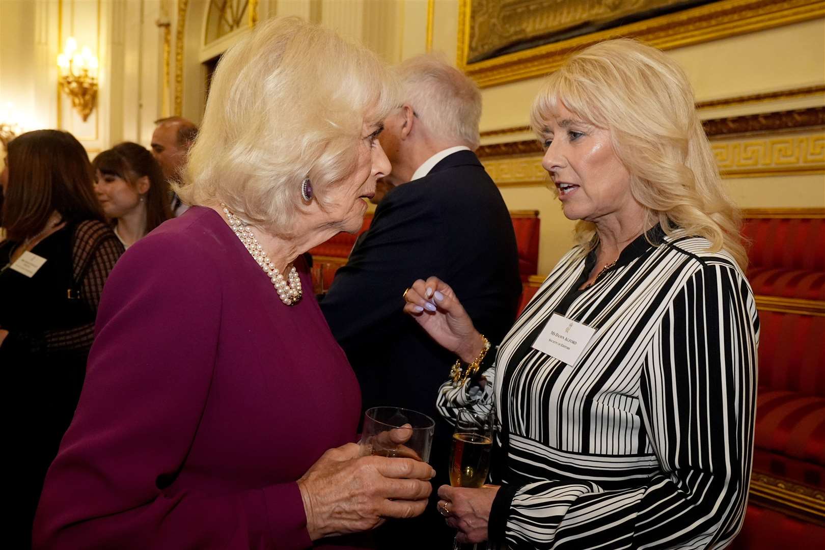Camilla chats to Dawn Alford, executive director at the Society of Editors (Aaron Chown/PA)
