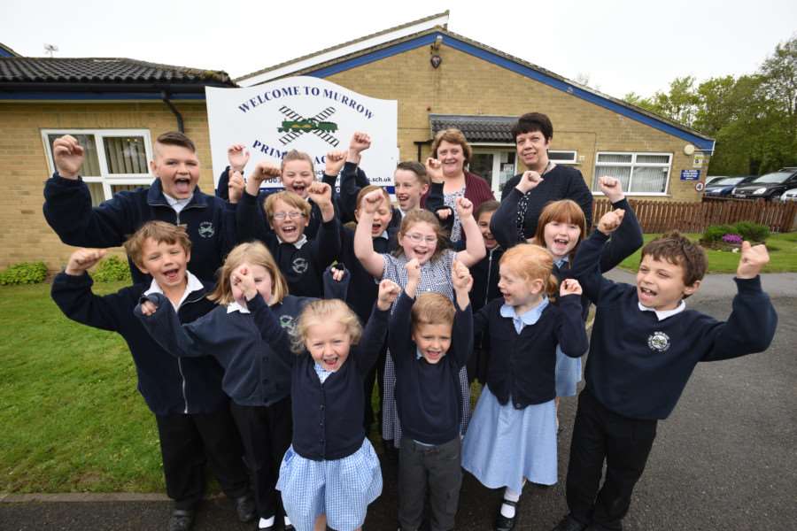Pupils from Murrow Primary Academy celebrate their Ofsted success with headteacher Rosie Simmonds and deputy headteacher Elaine Aldrich.