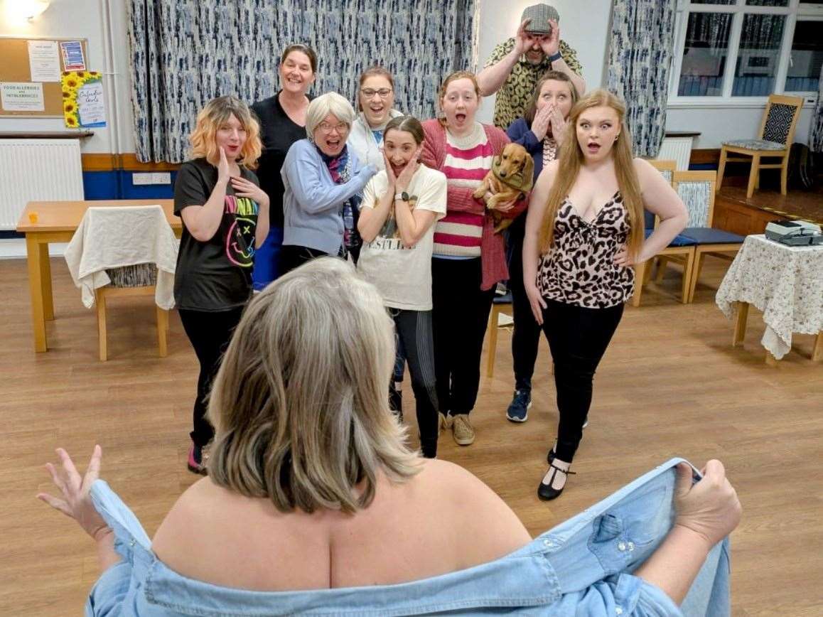 Chris (played by Kathy Philipot) 'baring all' to the cast