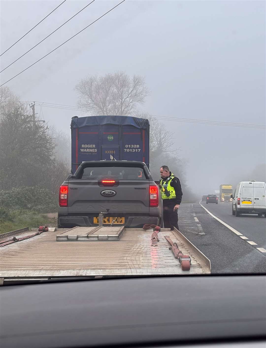 Officers speak at a vehicle they pulled over. Picture: Cambridgeshire Police