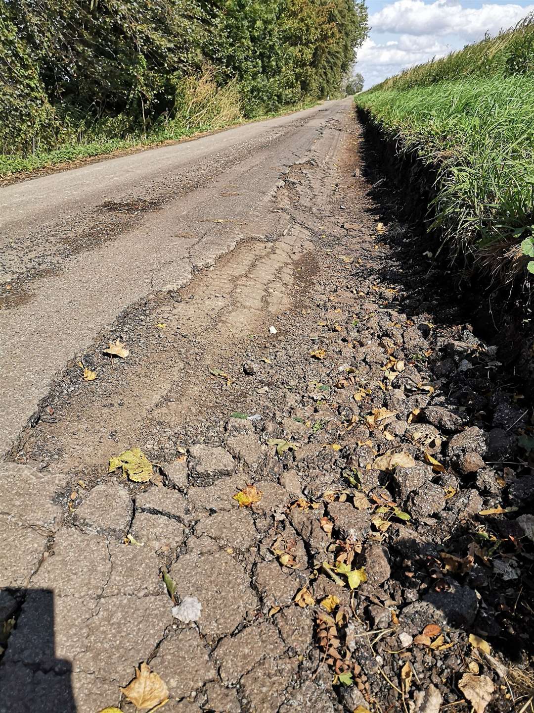Heavy lorries have caused major damage to a minor village road. (16207167)