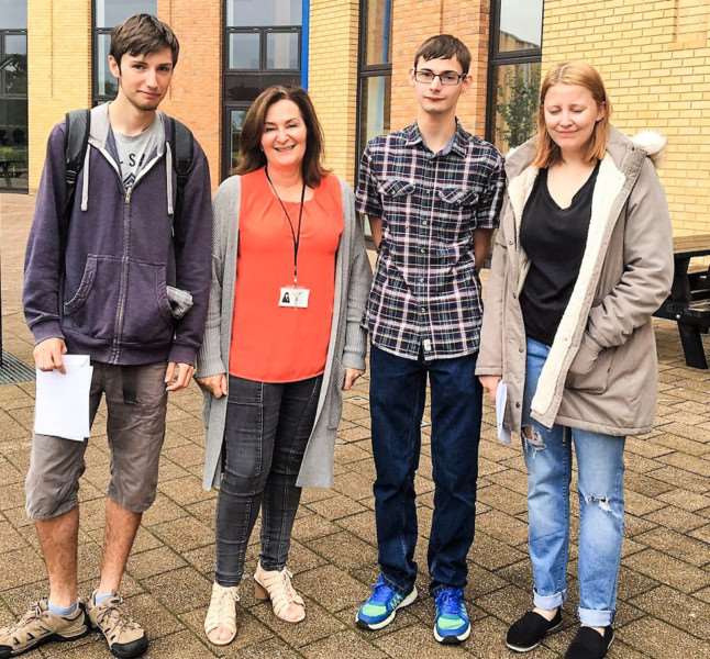 Students with principal Anne Hill pictured after getting their A-level results.