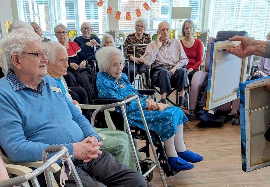 Gill Repper donates to Hickathrift House Care Home