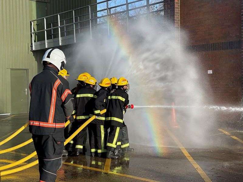 The young people learned how to use fire fighting equipment including hose pipes.