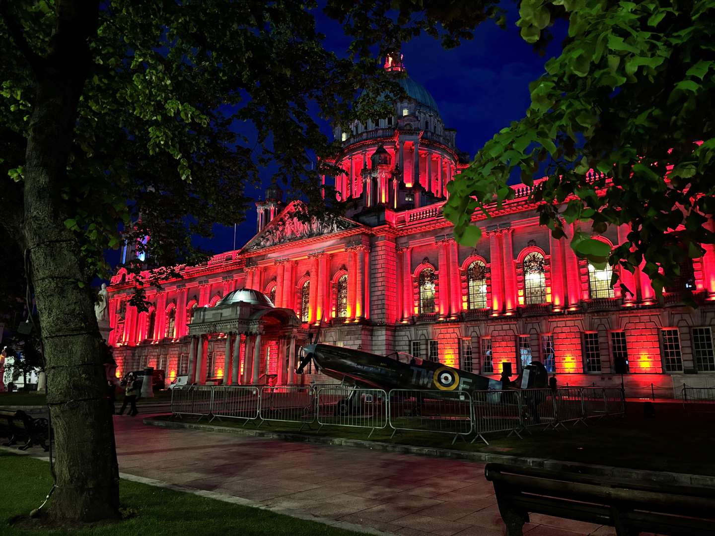 Belfast City Hall lit up in red on Wednesday night for the 80th Anniversary of VE Day (Rebecca Black/PA)
