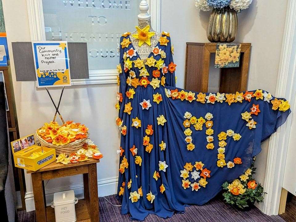 Residents, their families and staff all helped knit dozens of daffodils for the Marie Curie Day of Reflection display