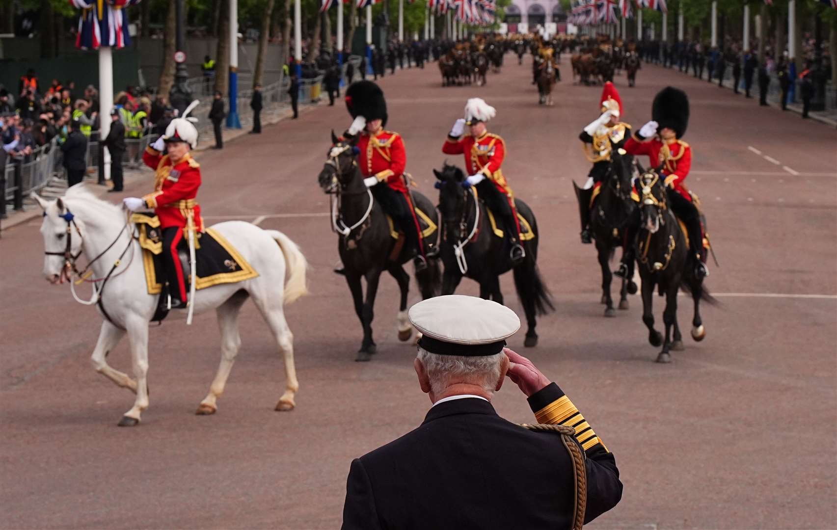 The King takes the salute (Aaron Chown/PA)