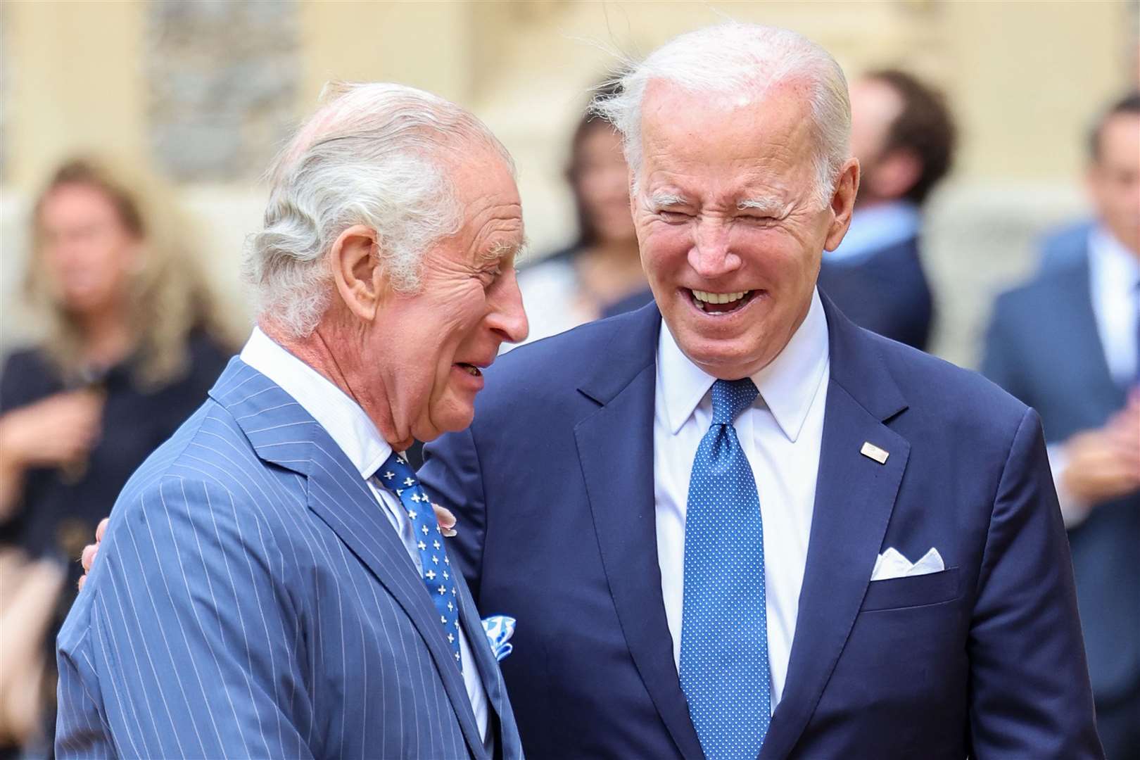 The King with Joe Biden in the quadrangle at Windsor Castle in 2023 (Chris Jackson/PA)