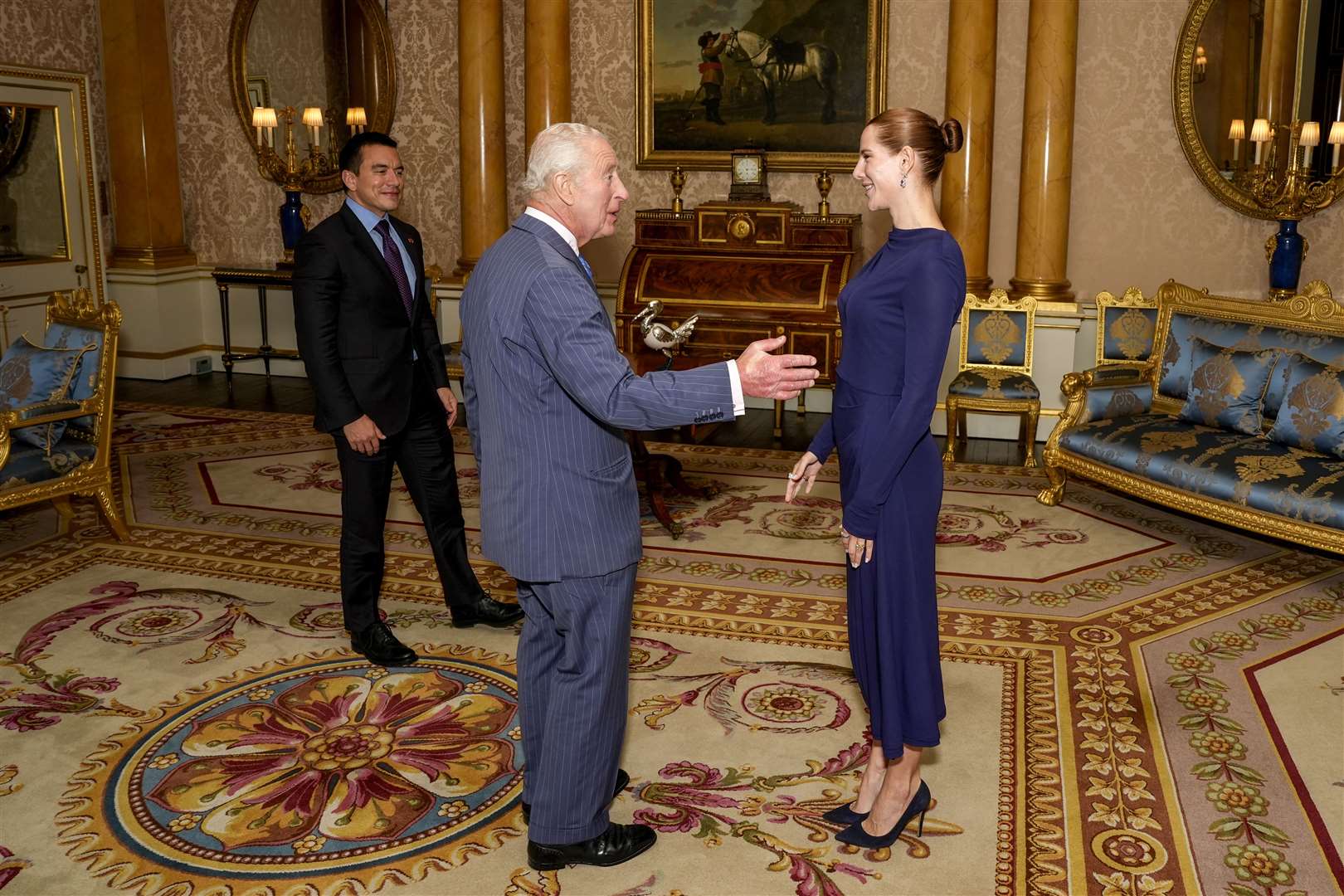Charles welcomes Angela Lavinia Valbonesi Acosta and Daniel Noboa (Jordan Pettitt/PA)