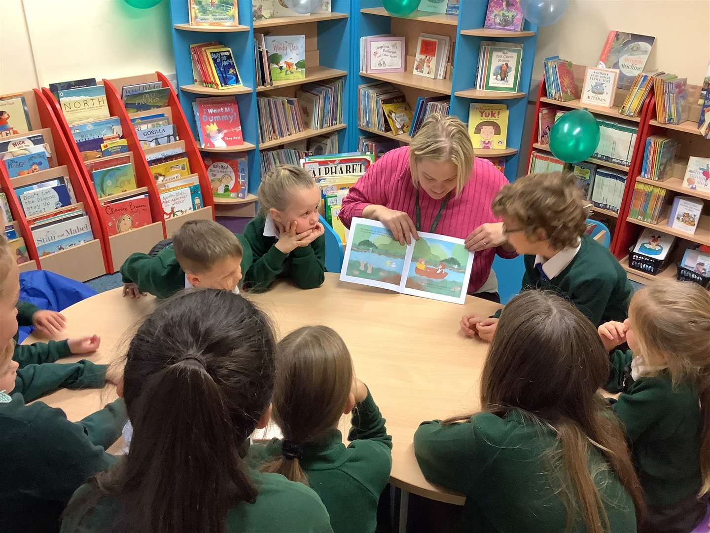 Local author Holly Wilkin talks about her children's book to some of the pupils.