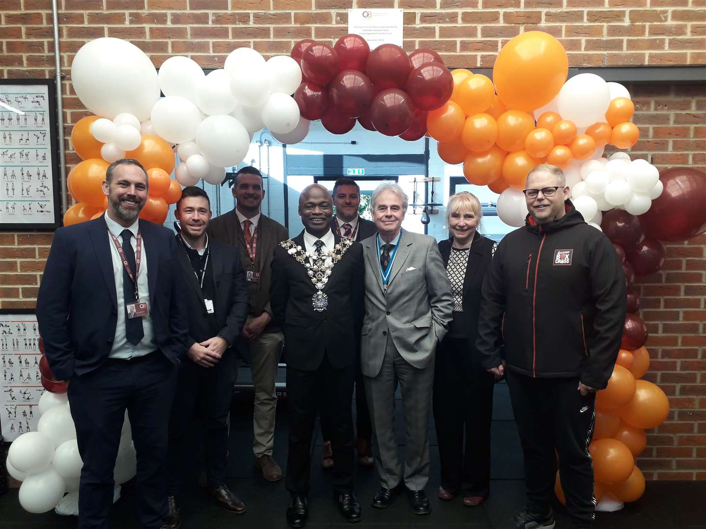 Olive Academy ribbon cutting: Ryan Kelsall - interim director of standards, Olive Academy; Adam Garford, communities service manager at Cambridgeshire County Council; David Saunders - academy head; Sidney Imafidon, Mayor of Wisbech; Dan Hobbs - deputy headteacher; David Way, High Sherriff of Cambridgeshire; Rosemary Way; Damien Pearl, BoxCross UK. Picture: Cambridgeshire County Council
