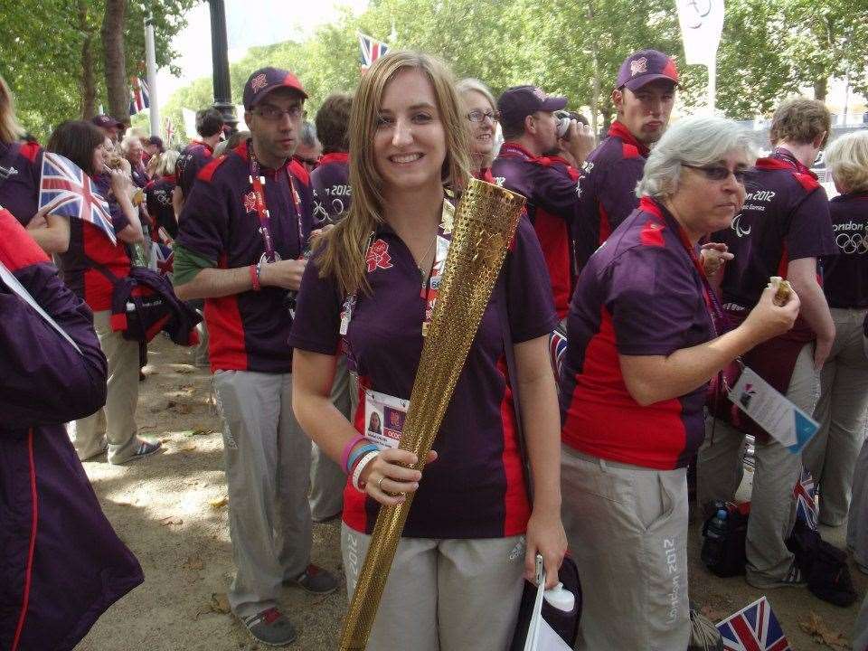 Here I am holding an Olympic torch!