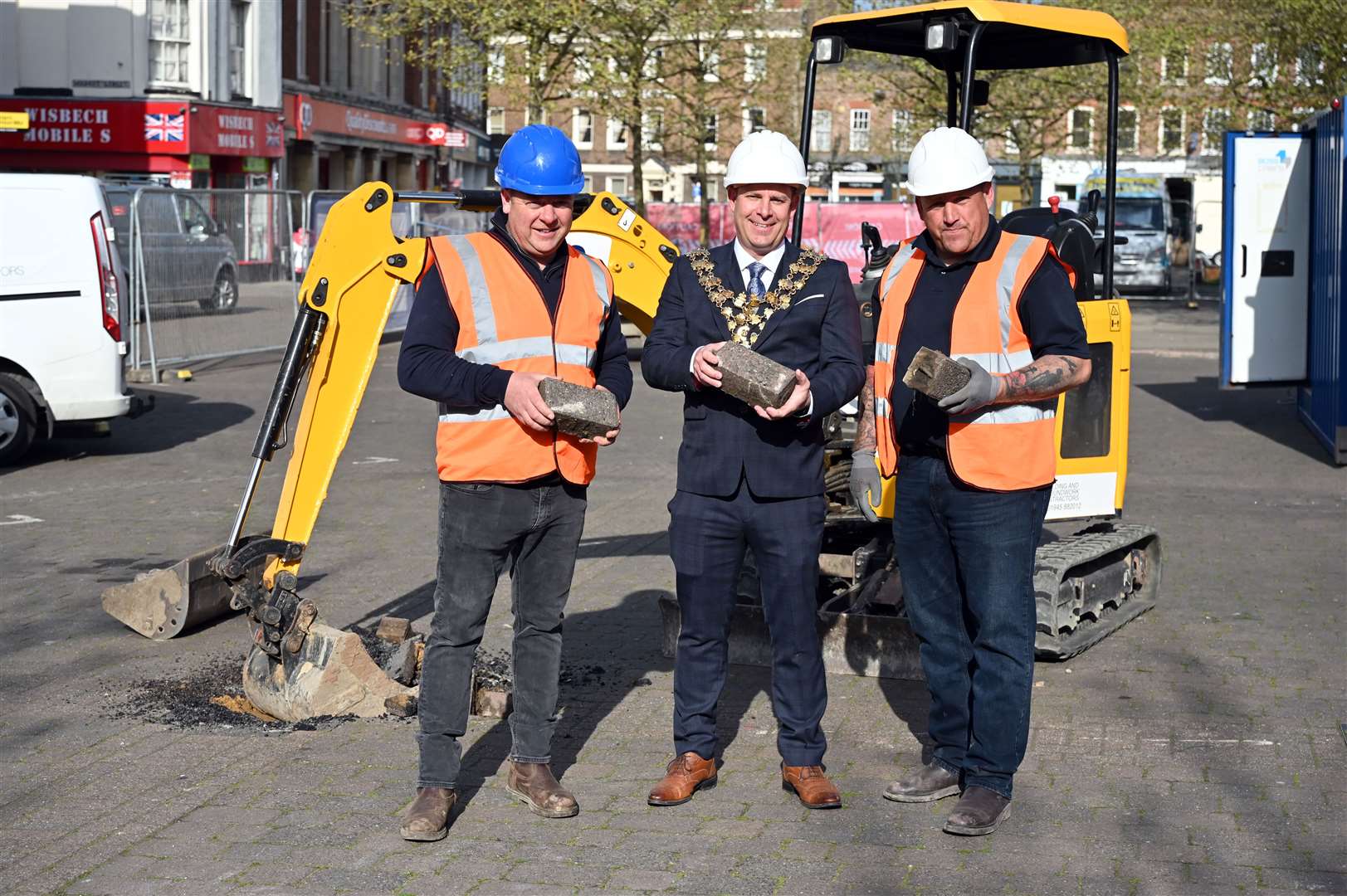 Start of work on the new revamp of Wisbech Market Place....Nick Barker MD Wisbech Mayor Andrew Lynn and Gary Whitby contract manager,. (56141639)