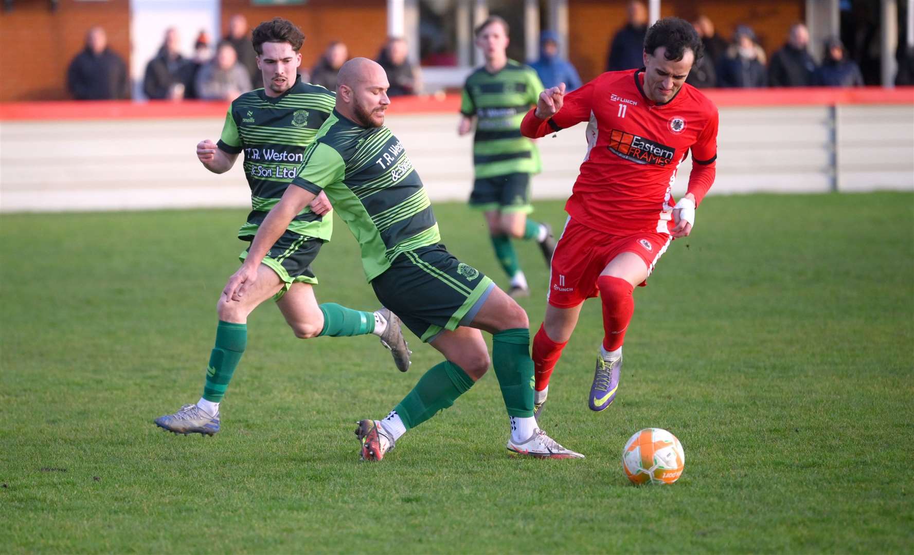 Amir Ward on the ball for Wisbech Town against Lincoln United