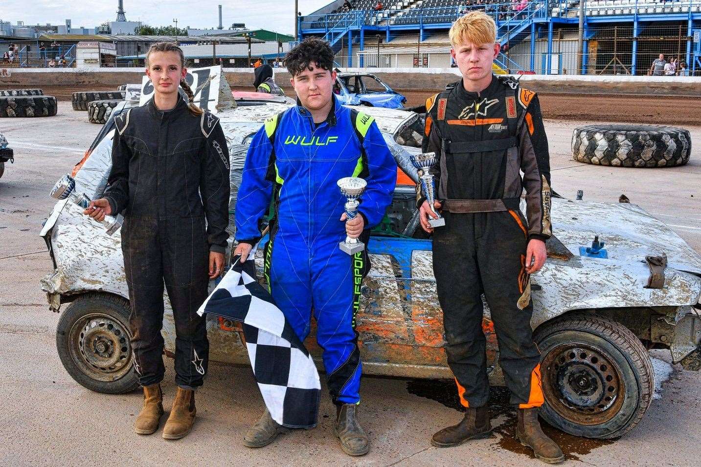There was a trio of Wisbech drivers in the top three in the first junior banger heat on Saturday which saw Keyan Murkin Everett, centre, take his first-ever win from Levi Murkin, right, and Jade Ellis, left. Picture: Jim Harrod
