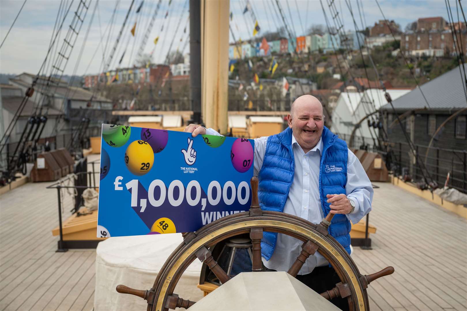 Alan Wilcock celebrated his win on board SS Great Britain (Allwyn/National Lottery/PA)