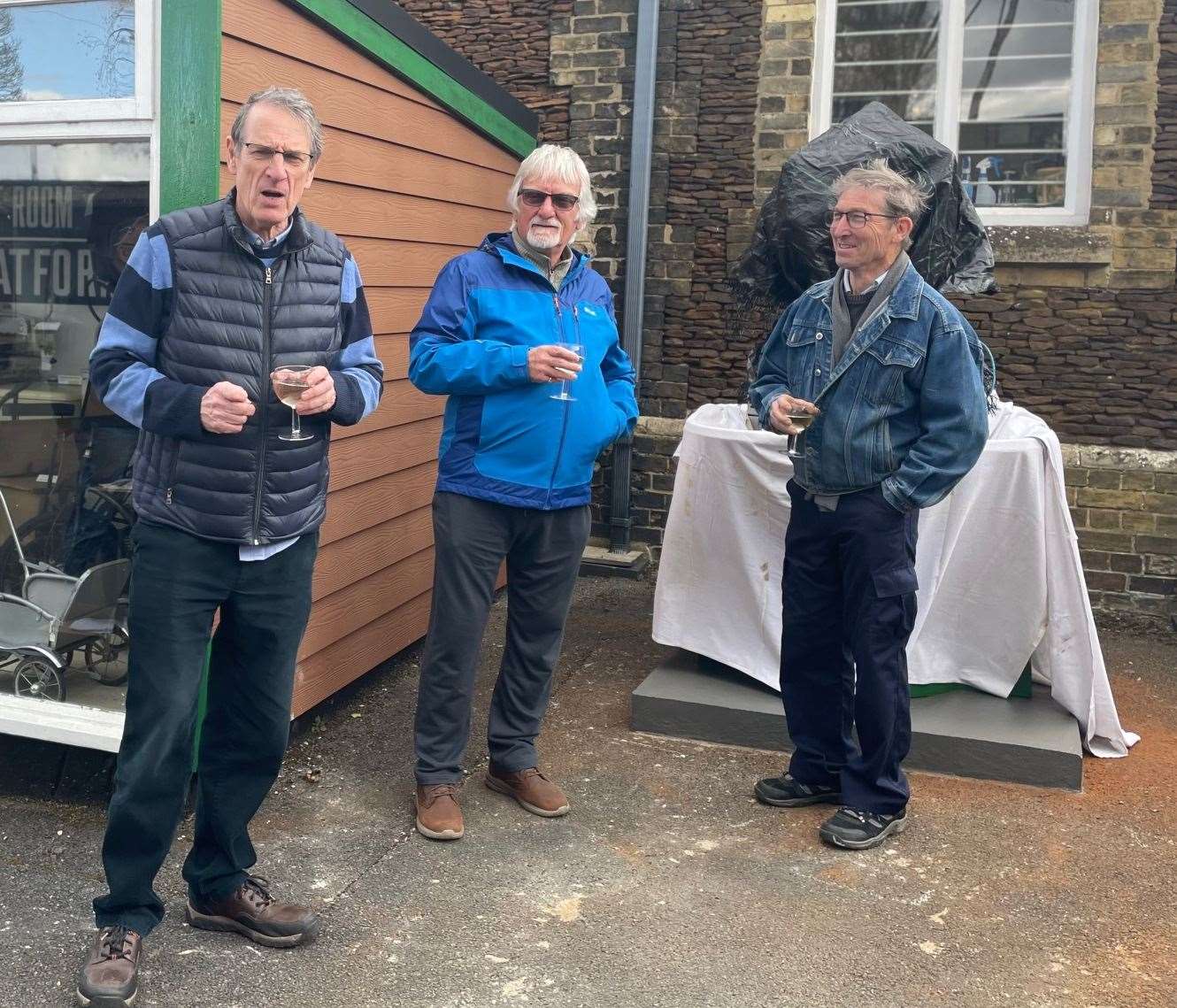 Museum chair Gordon Thorpe thanks volunteers David Bates (second left) and Kelvin Adams for their hardwork