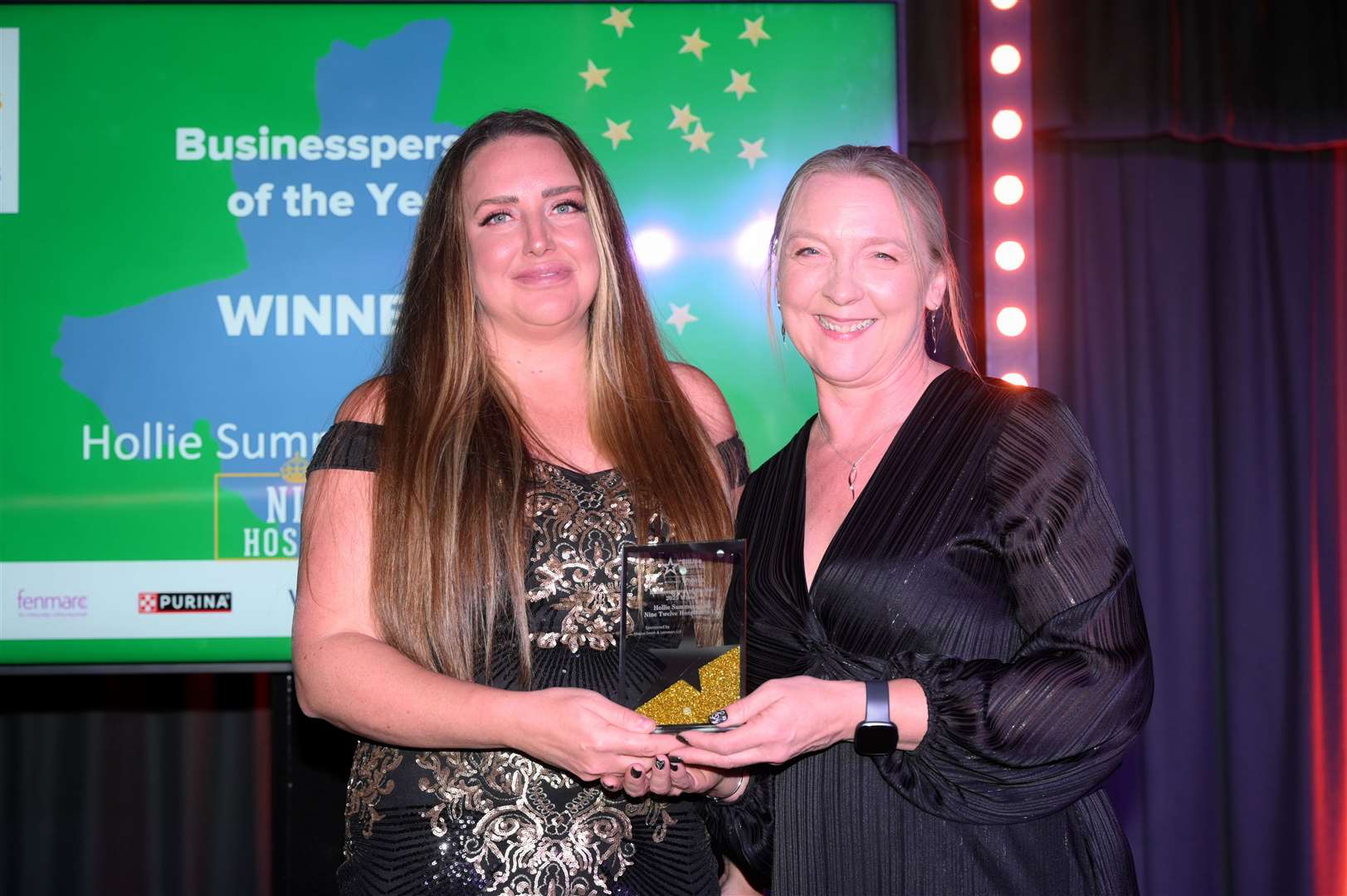 Fenland Citizen Business Awards 2025 Businessperson of the Year winner Hollie Summerscales - Nine Twelve Hospitality, who collected her award from Charlotte Horrobin of Cambridgeshire Chambers of Commerce