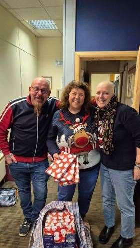 Emma Barnard, right, with Mandy Baxter from Boxes of Hope Holbeach and , left Darren Barnard