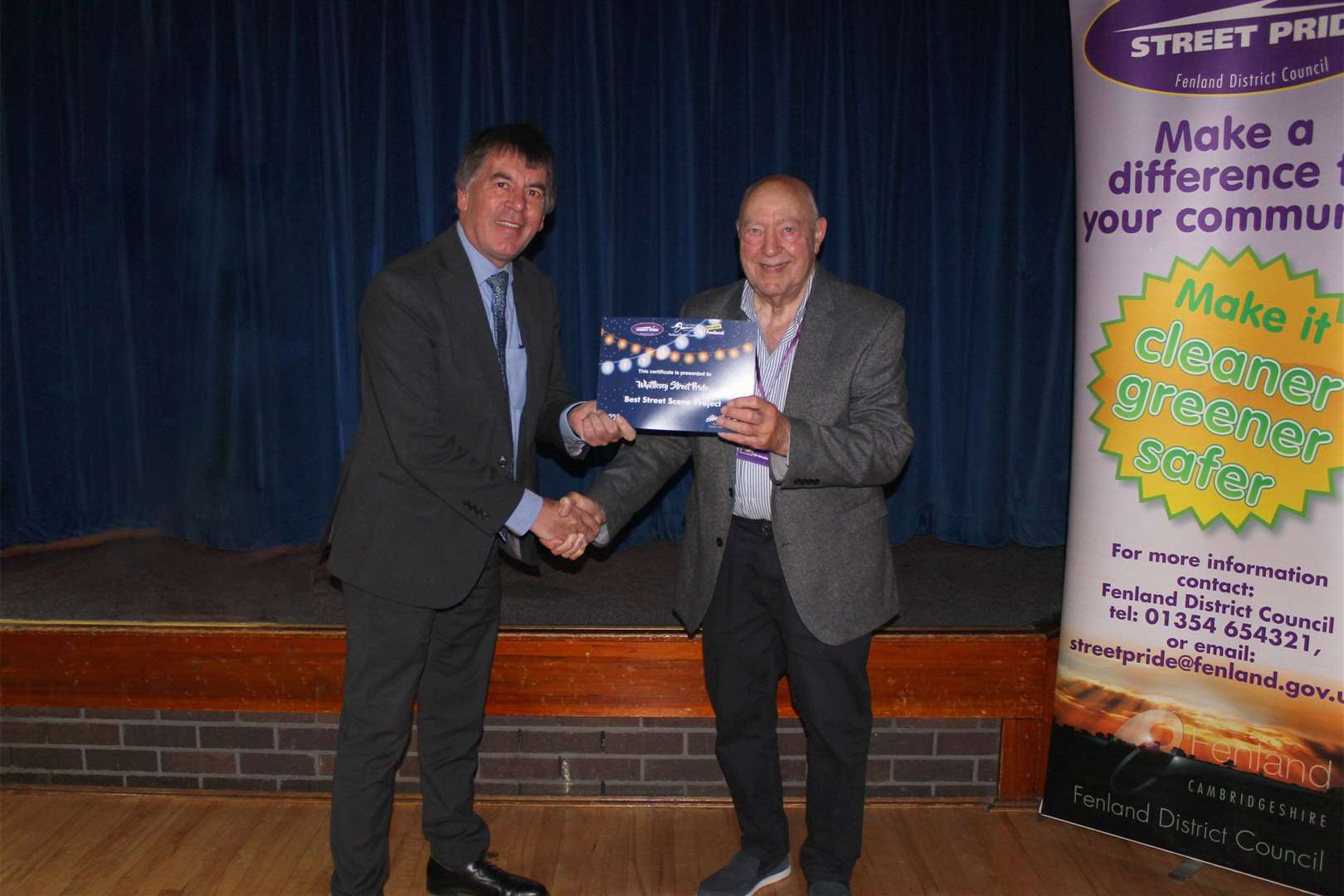 Eamonn Dorling collects award for Best Street Scene Project on behalf of Whittlesey Street Pride