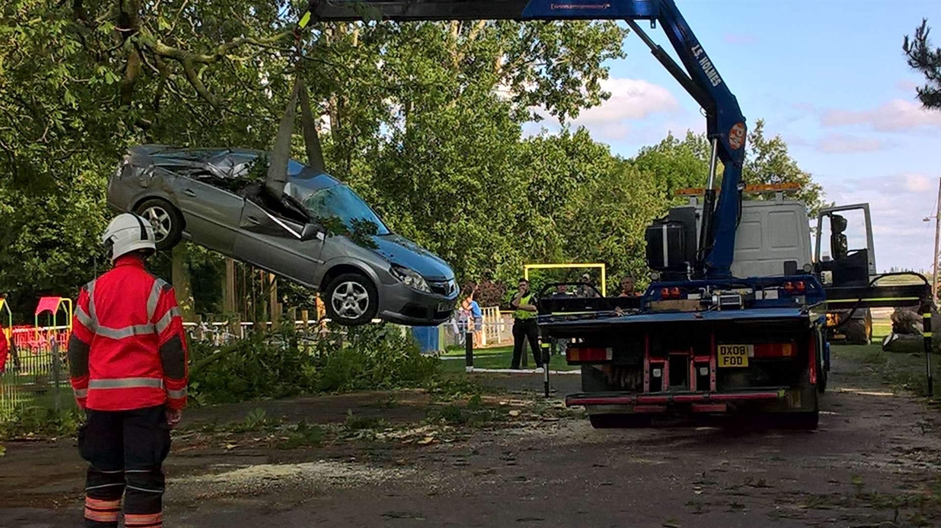 The massive branch crushed the parked car but the driver escaped with only minor injuries. (13826005)