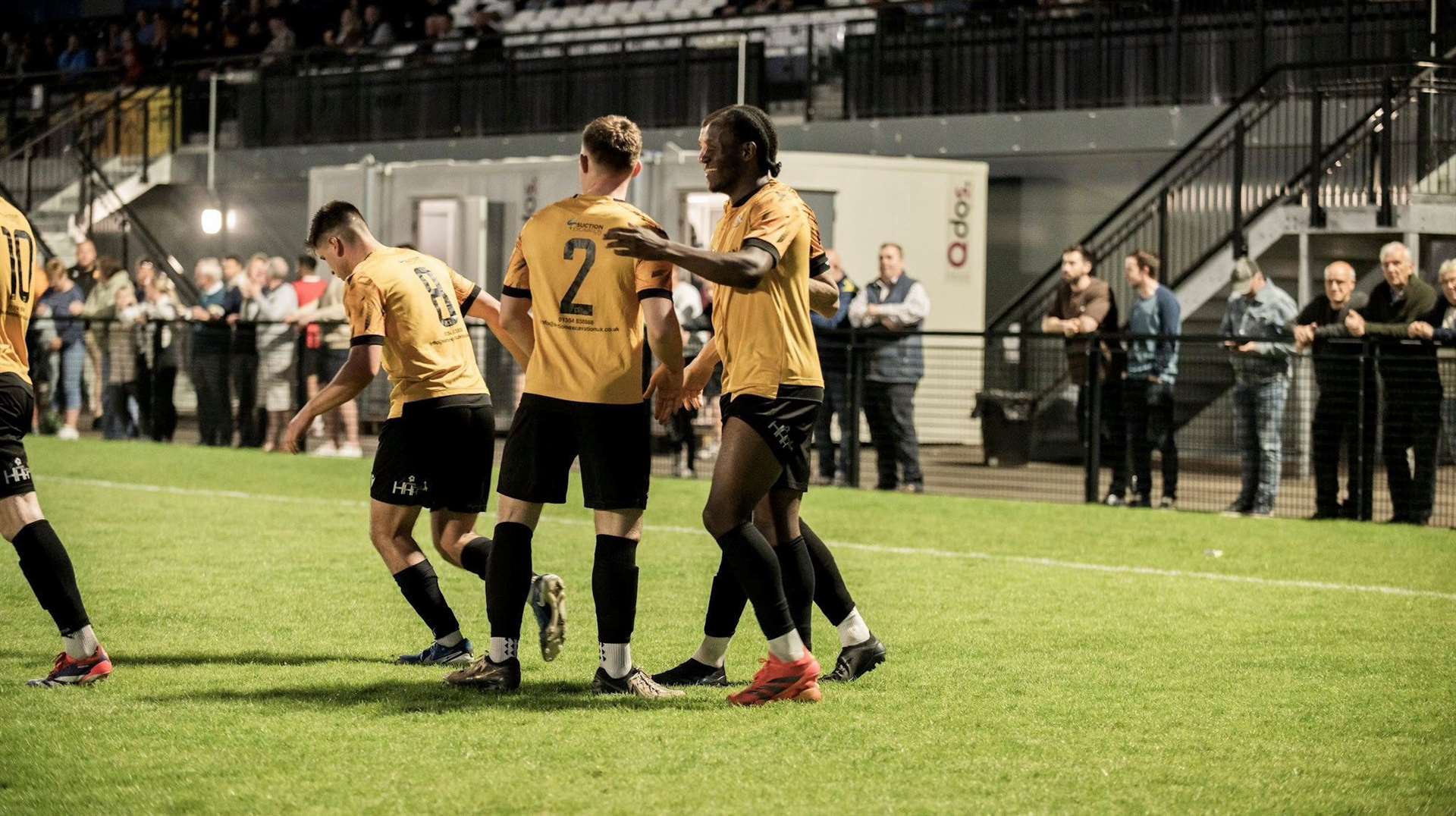 Josh Burrows and Flo Tsaguim celebrate March's second goal. Picture: Cambs FA